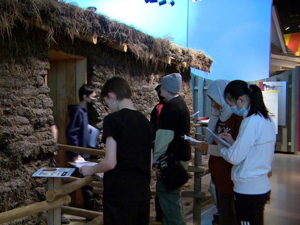 Grade 7 students from Caswell Community School check out the sod house at the Western Development Museum in Saskatoon. (Travis Reddaway/CBC - image credit)