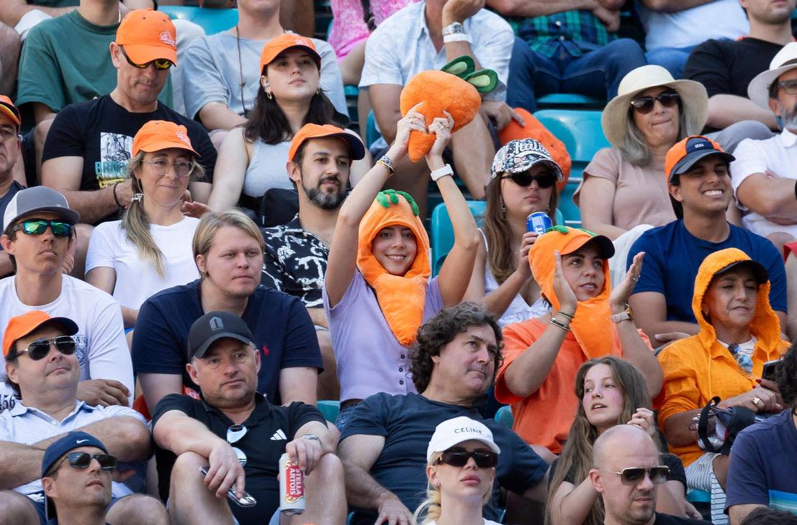 Fans of Jannik Sinner wear carrot costumes during his men’s final match against Grigor Dimitrov of Bulgaria at the Miami Open tennis tournament at Hard Rock Stadium on March 31, 2024, in Miami Gardens, Fla.