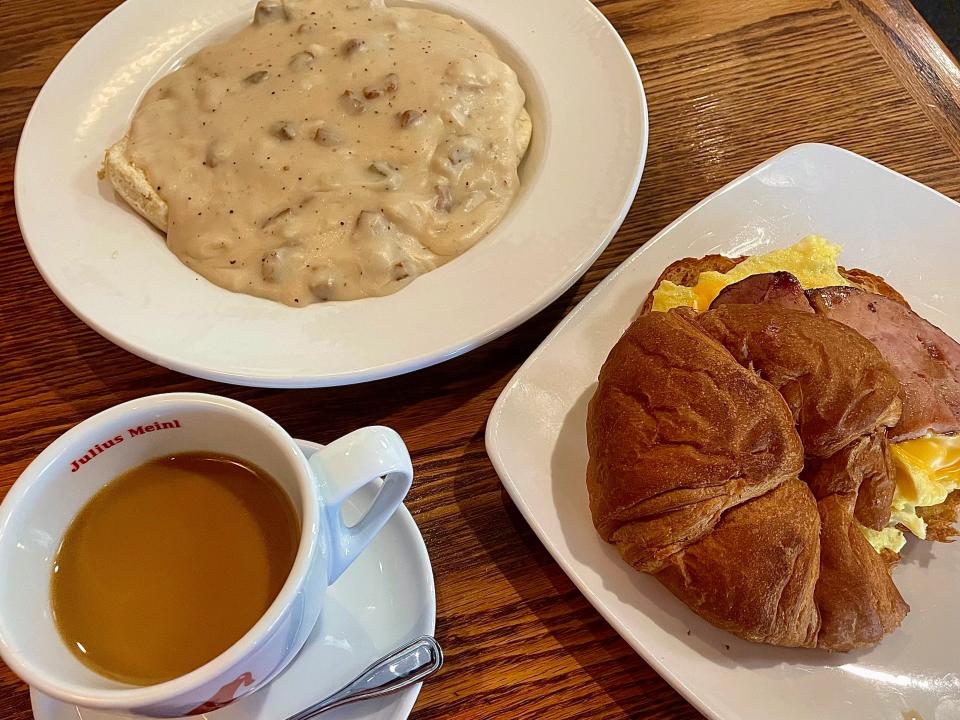 Southern Biscuits and Sausage Gravy, coffee and Hot Ham, Egg and Cheese Croissant from the Fly In Café in Port Orange.