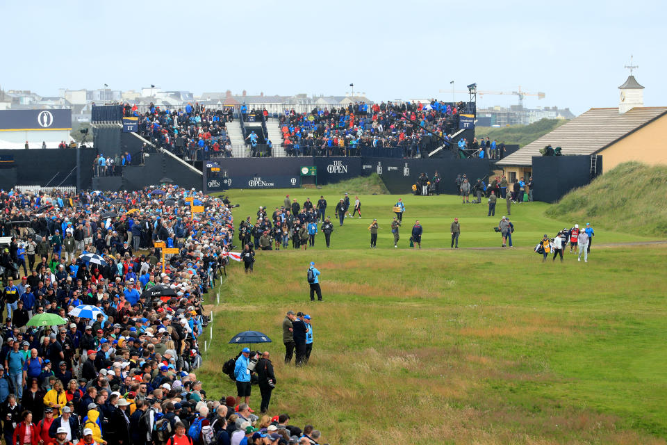 The group of Rory McIlroy of Northern Ireland, Paul Casey of England & Gary Woodland of the United States walk down the 1st tee during the first round of the 148th Open Championship held on the Dunluce Links at Royal Portrush Golf Club on July 18, 2019 in Portrush, United Kingdom. (Photo by Andrew Redington/Getty Images)