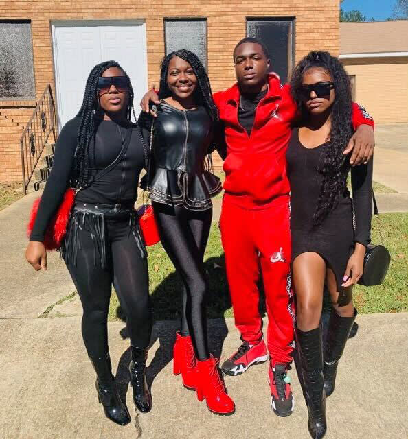 Jaylen Lewis with his sisters, Alexus Lewis, from left, Uneisha Lewis and Keia Lewis. (Family photos)