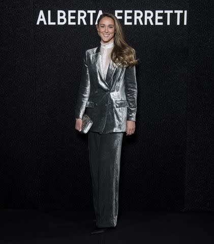 <p>STEFANO TROVATI/Shutterstock</p> Kylie Kelce makes Milan Fashion Week debut in a glam silver velvet suit on Feb. 21
