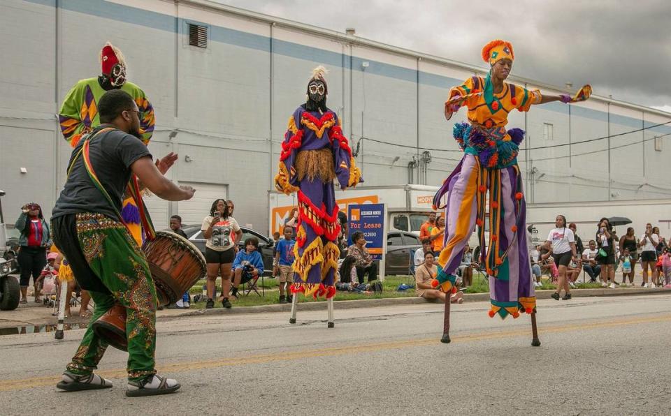 This year’s JuneteenthKC parade featured as special guests the Zulu Connection Stilt Dancers from New Orleans, who drummed and danced on stilts in traditional African costumes.