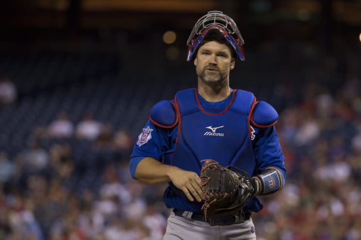 Beloved Cub David Ross will remain with the team in a behind-the-scenes role. (AP)