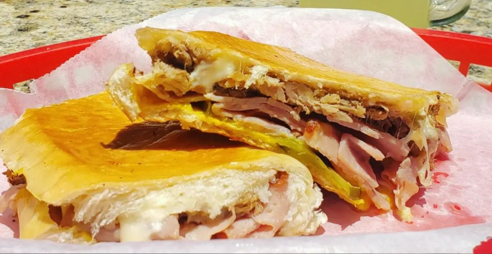 A classic Cuban sandwich from Flaco's Cuban Bakery, 200 W. University Ave., Gainesville, is made with bolo ham, pulled pork, mustard, pickles, Swiss cheese and pressed on Cuban bread.