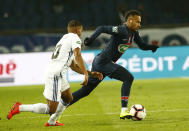 Strasbourg's Samuel Grandsir, left, nd PSG's Neymar challenge for the ball during the French Cup soccer match between Paris Saint Germain and Strasbourg at the Parc des Princes stadium in Paris, Wednesday, Jan. 23, 2019. (AP Photo/Michel Euler)