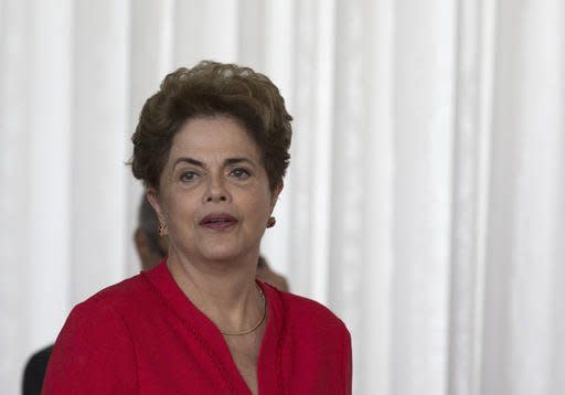 Brazil's ousted President Dilma Rousseff arrives for her speech at the official residence of the president, Alvorada Palace in Brasilia, Brazil, Wednesday, Aug. 31, 2016. In her first remarks after being ousted as Brazil's president, Rousseff is vowing to form a strong opposition front against the new government. saying,