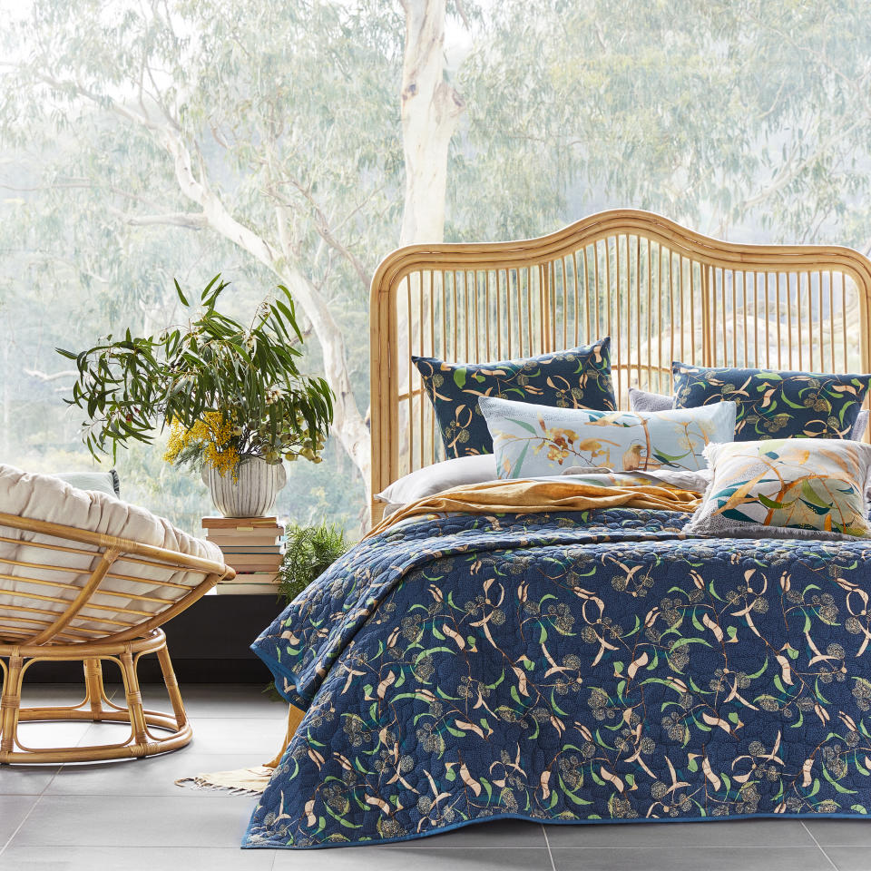 This $150 Queen-size bedspread design by Australian artist Dana Kinter, features wattle and eucalyptus. Photo: Adairs x Dana Kinter