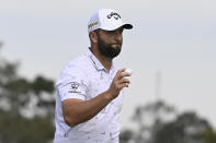Jon Rahm of Spain holds up the ball after hitting a birdie on the second hole of the South Course during the third round of the Farmers Insurance Open golf tournament, Friday Jan. 28, 2022, in San Diego. (AP Photo/Denis Poroy)