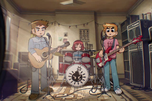 <p>Netflix</p> Mark Webber as Stephen Stills, Alison Pill as Kim Pine and Michael Cera as Scott Pilgrim