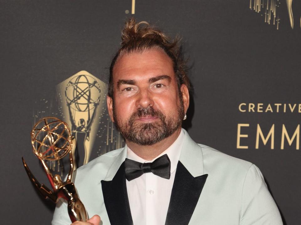 Marc Pilcher poses with the award for Outstanding Period And/Or Character Hairstyling for ‘Bridgerton’ at the 2021 Emmys (Getty Images)