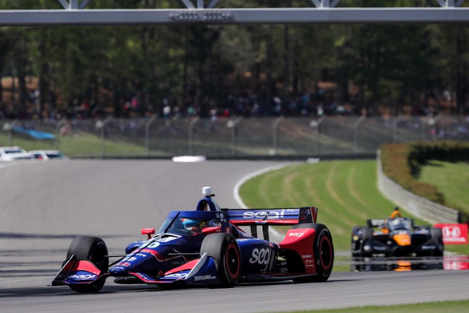 Alex Palou landed his first IndyCar victory Sunday at Barber Motorsports Park, riding a two-stop strategy to edge out Will Power.