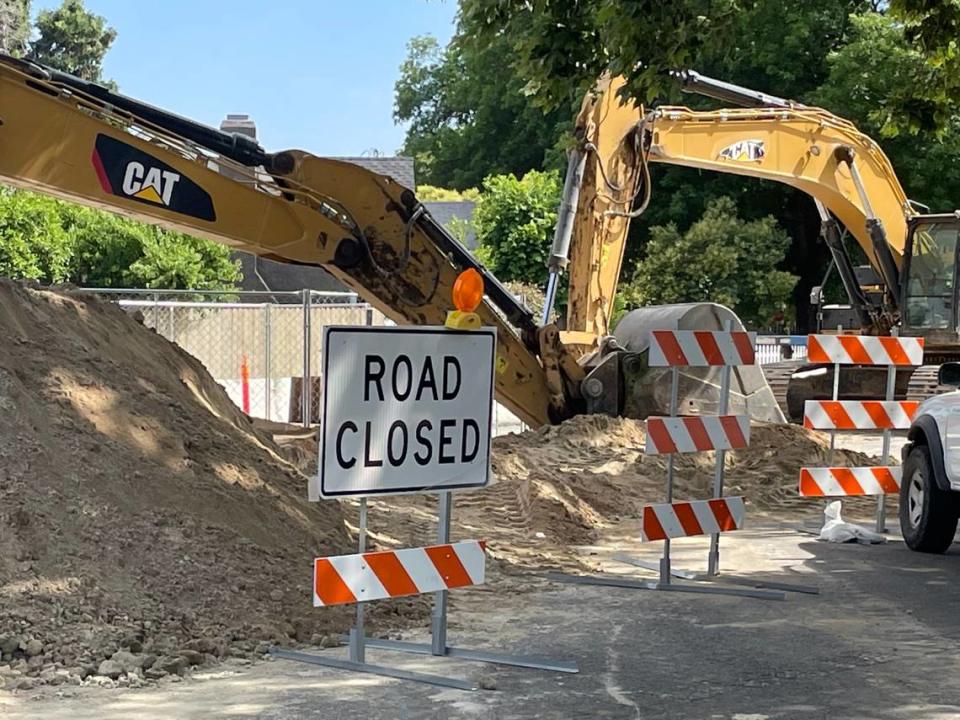 Backhoes are in place for a sewer main replacement project in Modesto, California, on June 12, 2023.
