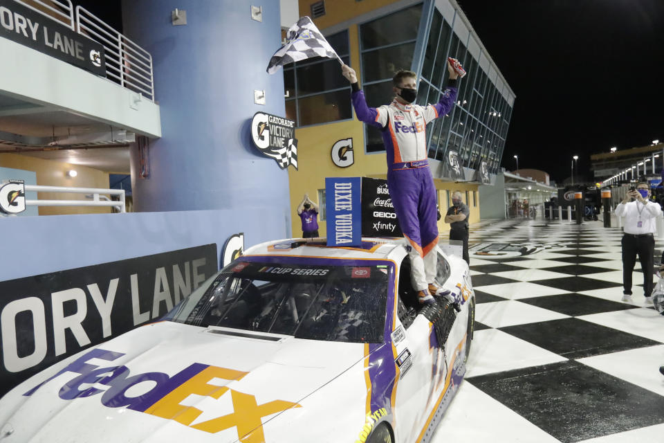 Denny Hamlin celebrates after winning a NASCAR Cup Series auto race Sunday, June 14, 2020, in Homestead, Fla. (AP Photo/Wilfredo Lee)