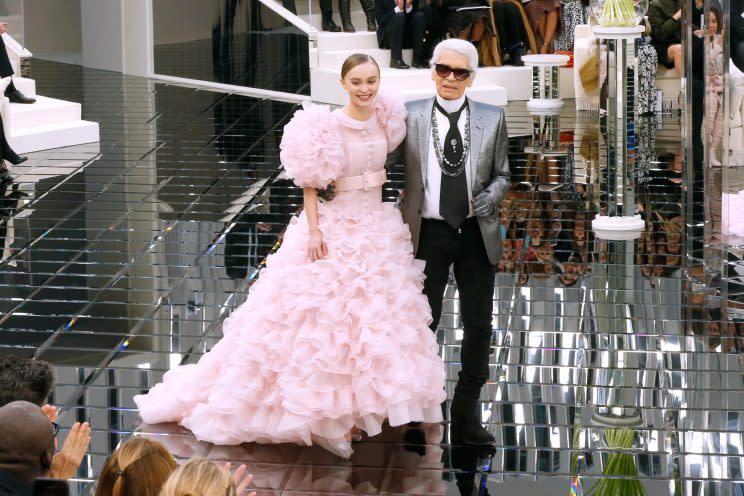 Lily-Rose Depp and Karl Lagerfeld at the Chanel show. (Photo: Getty Images)
