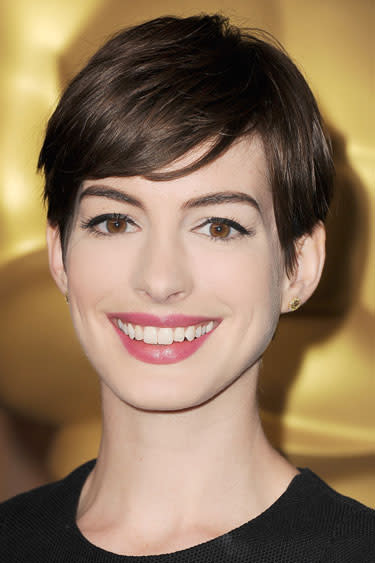 <div class="caption-credit"> Photo by: Steve Granitz/WireImage</div><div class="caption-title">Anne Hathaway</div><b>The Cut:</b> The Oscar-winner's hairstylist <a rel="nofollow noopener" href="https://www.facebook.com/AdirAbergel?link=emb&dom=yah_life&src=syn&con=blog_blog_hbz&mag=har%20" target="_blank" data-ylk="slk:Adir Abergel;elm:context_link;itc:0;sec:content-canvas" class="link ">Adir Abergel</a> describes this cut as a modern pixie with tomboy swagger. "It has a long, sideswept bang and the back is short and heavily layered for a soft, feminine line," he says. <br> <b>What You Should Know:</b> "Short hair looks great on anyone with dramatic features," says Abergel. He also puts to bed the myth that a closely shorn style is one-note. "Slick it with gel and part on the side for a sleek, wet look. Or let it air dry and add texture with pomade for a messier vibe," he adds. <br> <b><br> Read More: <br> <a rel="nofollow noopener" href="http://www.harpersbazaar.com/beauty/health-wellness-articles/skincare-tools-0311?link=emb&dom=yah_life&src=syn&con=blog_blog_hbz&mag=har" target="_blank" data-ylk="slk:Skin Gadgets That Actually Work;elm:context_link;itc:0;sec:content-canvas" class="link ">Skin Gadgets That Actually Work</a></b> <br> <b><a rel="nofollow noopener" href="http://www.harpersbazaar.com/beauty/health-wellness-articles/fitness-diaries-get-fit-fast-0612?link=emb&dom=yah_life&src=syn&con=blog_blog_hbz&mag=har" target="_blank" data-ylk="slk:Steps to Get Fit in Four Weeks;elm:context_link;itc:0;sec:content-canvas" class="link ">Steps to Get Fit in Four Weeks</a></b> <br>