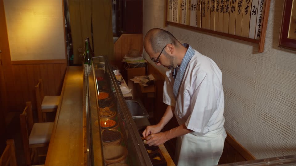 Yosuke Miura is the third-generation chef-owner of Onigiri Asakusa Yadoroku, believed to be the oldest onigiri restaurant in Tokyo. - CNN