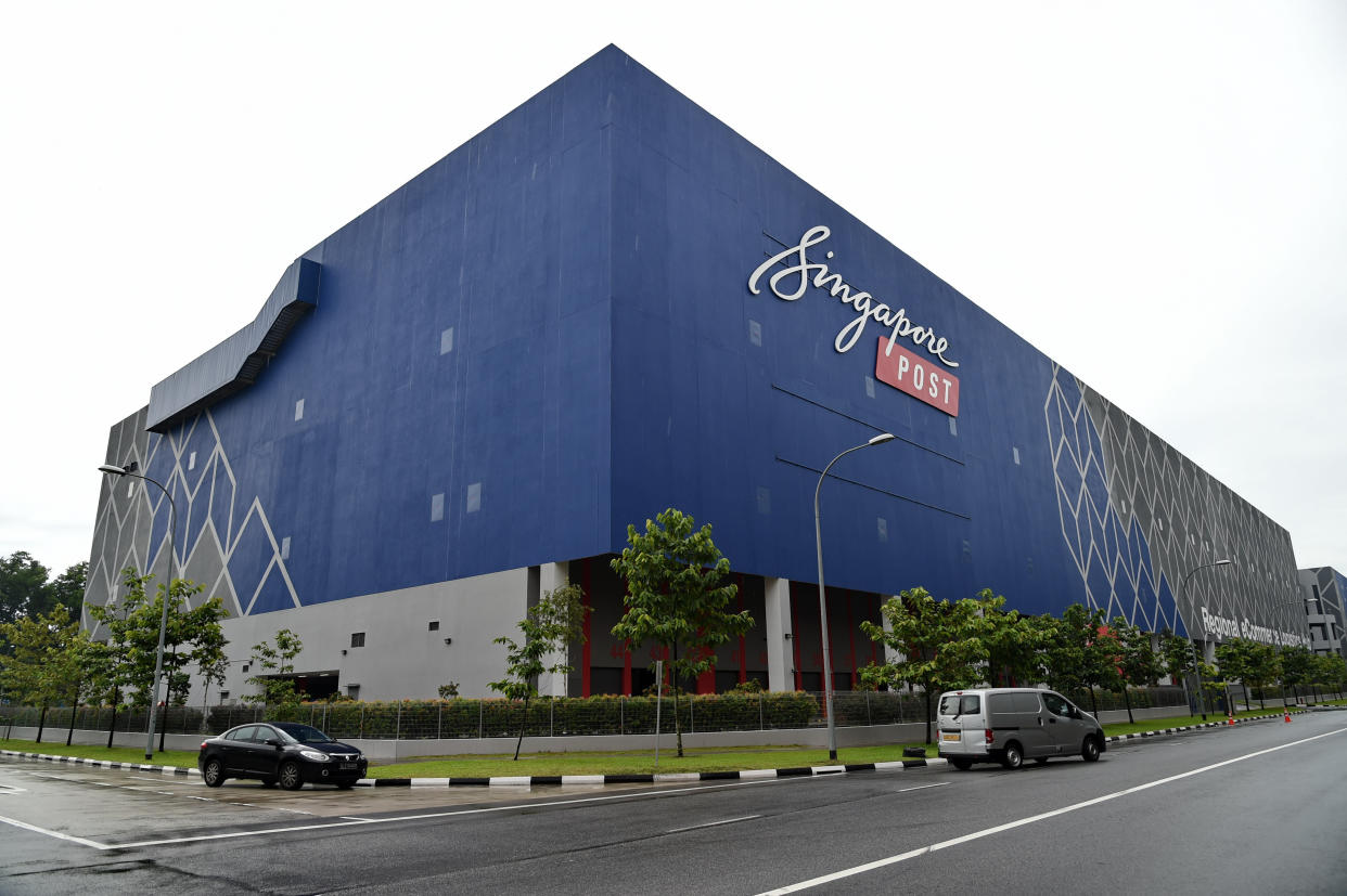 An image showing the blue facade of the SingPost Regional eCommerce Logistics Hub in Singapore.