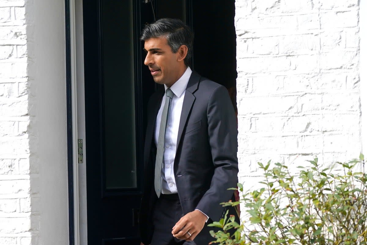 Rishi Sunak leaving his home on Monday (PA)