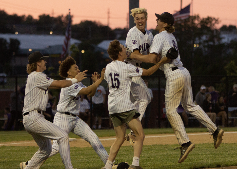 Elder baseball players celebrate the final out of the Panthers' 6-2 win over Lebanon in the Division I district championship game at Princeton High School on Thursday, May 25, 2023