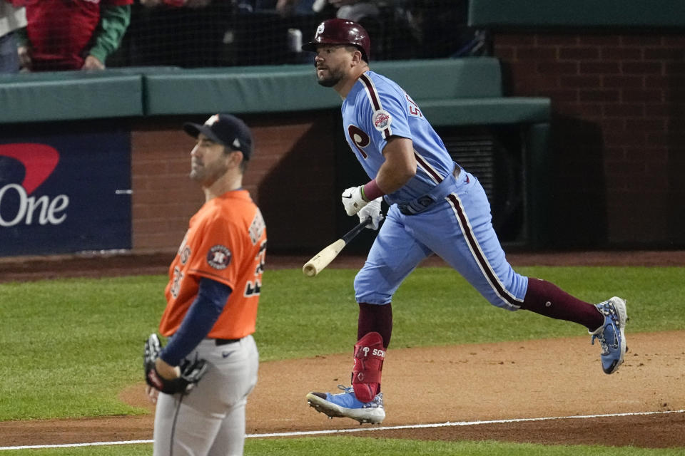 Philadelphia Phillies' Kyle Schwarber watches his home run off Houston Astros starting pitcher Justin Verlander during the first inning in Game 5 of baseball's World Series between the Houston Astros and the Philadelphia Phillies on Thursday, Nov. 3, 2022, in Philadelphia. (AP Photo/Matt Rourke)