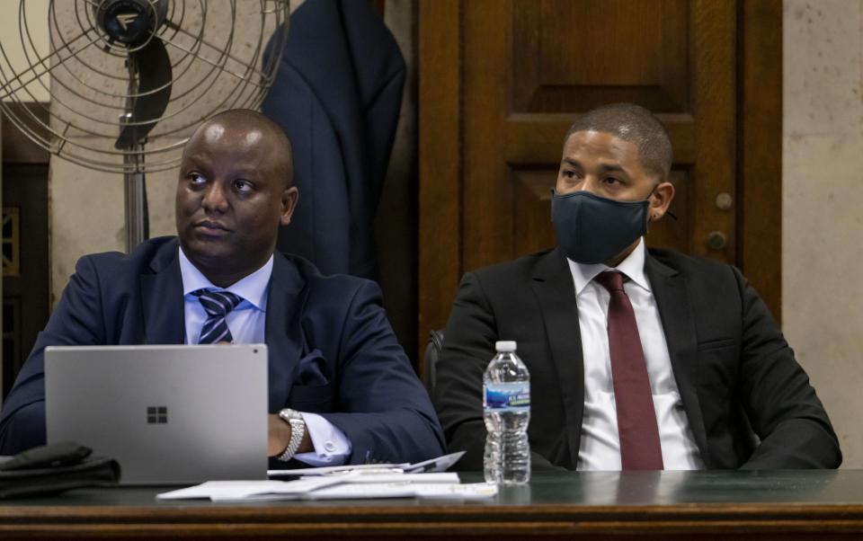 Actor Jussie Smollett, right, appears at his sentencing hearing at the Leighton Criminal Court Building, Thursday, March 10, 2022, in Chicago. (Brian Cassella/Chicago Tribune via AP, Pool)