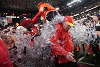 Kansas City Chiefs head coach Andy Reid is splashed after the NFL Super Bowl 58 football game against the San Francisco 49ers, Sunday, Feb. 11, 2024, in Las Vegas. The Chiefs won 25-22. (AP Photo/Ashley Landis)