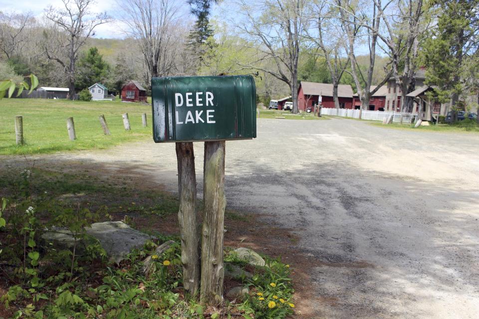 The Deer Lake Boy Scout Reservation in Killingworth, Conn., sits empty, Wednesday, May 11, 2022. The camp is among many nationwide being sold by local councils as membership dwindles and the organization raises money to pay sexual abuse victims as part of a bankruptcy settlement. Conservationists, government officials and others are scrambling to find ways to preserve them as open space. (AP Photo/Pat Eaton-Robb)