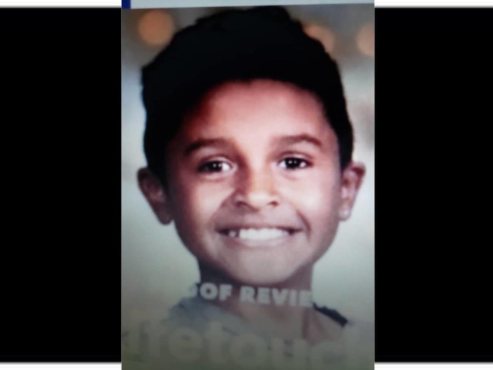 Ashayo Johnson was wearing a blue puffy jacket with black sweat pants and light blue sneakers when he was reported missing. (RCMP - image credit)