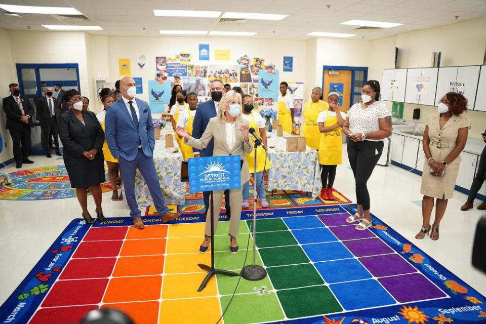 First Lady Jill Biden visited Detroit’s Schulze Academy for Technology and Arts in July 2021. Education Secretary Miguel Cardona, behind Biden, praised the district’s use of COVID stimulus funds, saying it was doing “exceptionally well” at giving students enrichment opportunities like learning photography and cooking. (DPSCD/Facebook)