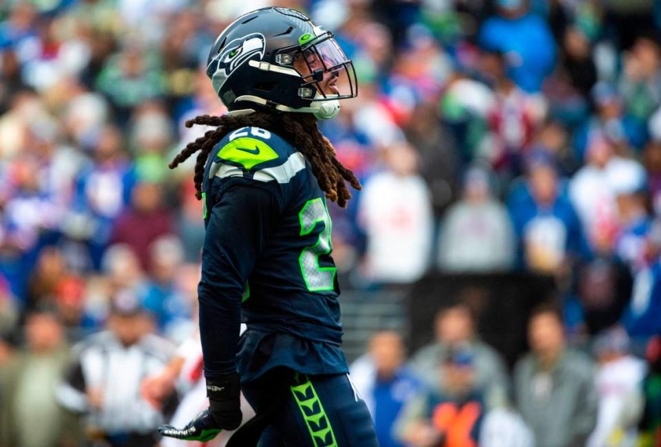 Seattle Seahawks safety Ryan Neal (26) celebrates after making a tackle in the third quarter of an NFL game at Lumen Field in Seattle, Wash. on Oct. 30, 2022. The Seahawks defeated the Giants 27-13.