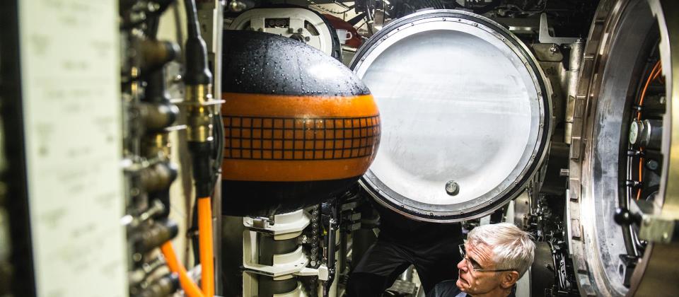 Two impressions of a German Navy Type 212A Batch II class submarine loading a DM2A4 Seehecht heavyweight torpedo. <em>Photo by Olav StandalTangen</em>