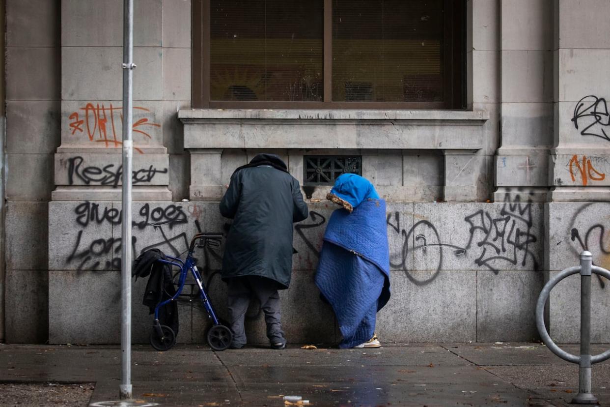 A scene from the Downtown Eastside neighbourhood of Vancouver on Oct. 27, 2022. A new report shows the number of people experiencing homelessness in Vancouver and its suburbs has increased 32 per cent in three years. (Ben Nelms/CBC - image credit)