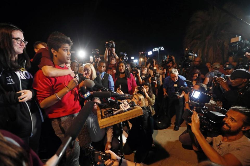 One students speaks to a crowd of supporters arriving in Tallahassee (AP)