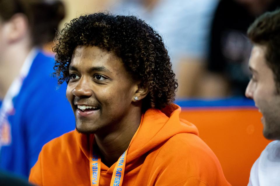 Florida Gators recruit Jaden Rashada smiles on the sideline during the second half against the Florida Gators at Steve Spurrier Field at Ben Hill Griffin Stadium in Gainesville, FL on Saturday, November 12, 2022. [Matt Pendleton/Gainesville Sun]