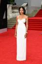 <p>Naomie Harris wore a white Michael Kors column dress with an Omega watch, and a delicate silver chain through her hair. </p>
