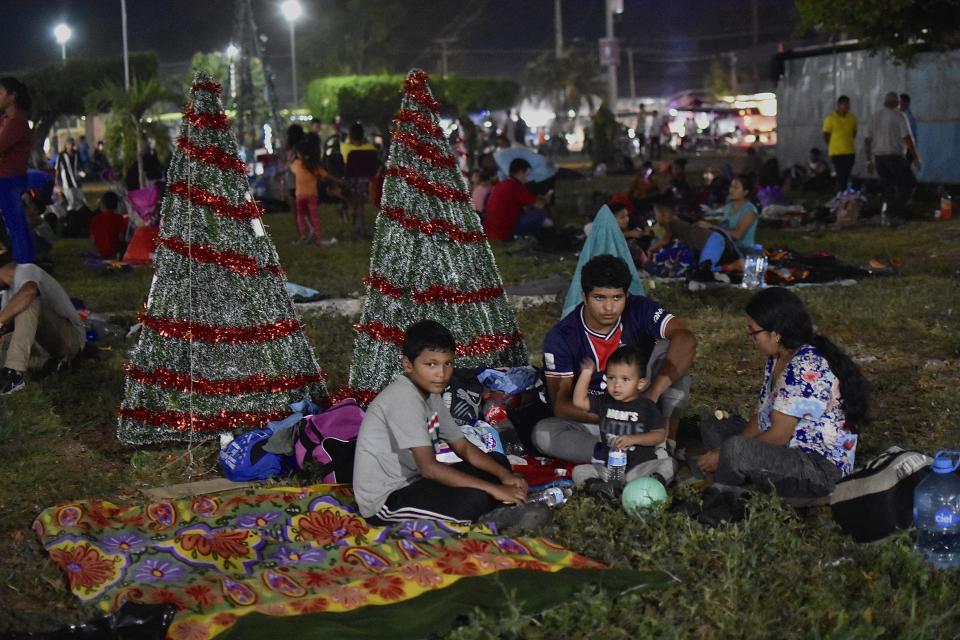 Migrants camp in Alvaro Obregon, Mexico, Sunday, Dec. 24, 2023. A caravan or migrants started the trek north from Tapachula on Sunday, just days before U.S. Secretary of State Antony Blinken arrives in Mexico City to discuss new agreements to control the surge of migrants seeking entry into the United States. (AP Photo/Edgard H. Clemente)