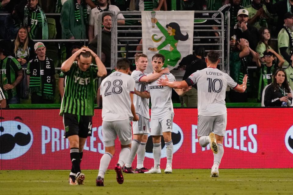 St. Louis City SC midfielder Jared Stroud, center, celebrates his goal with teammates as Austin FC defender Kipp Keller walks away during the second half of Saturday night's 3-2 loss. Keller, in only his seventh career MLS game, was forced into extended duty when Julio Cascante was injured.