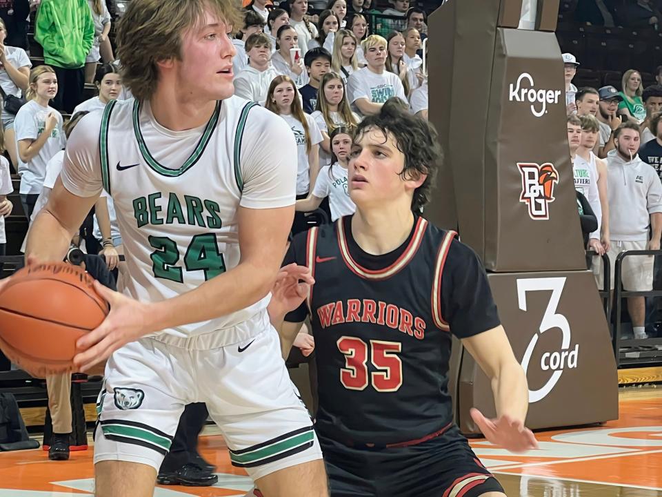 Worthington Christian’s C.J. Miller defends Castalia Margaretta’s Gage Bodey during a Division III regional semifinal Wednesday at Bowling Green.