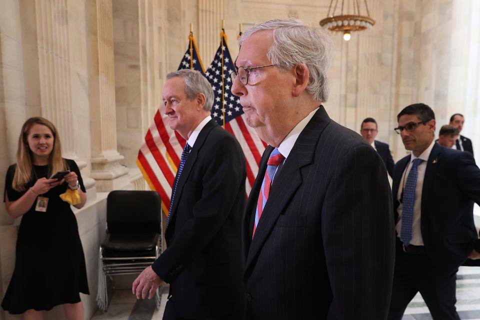 Senate Minority Leader Mitch McConnell of Kentucky opposed a commission to study the Jan. 6 riot and said the Justice Department is already prosecuting more than 400 suspects in the attack.