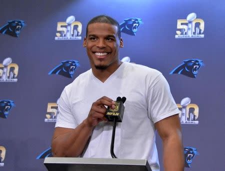 Feb 2, 2016; San Jose, CA, USA; Carolina Panthers quarterback Cam Newton addresses the media at press conference prior to Super Bowl 50 at the San Jose McNery Convention Center. Mandatory Credit: Kirby Lee-USA TODAY Sports -