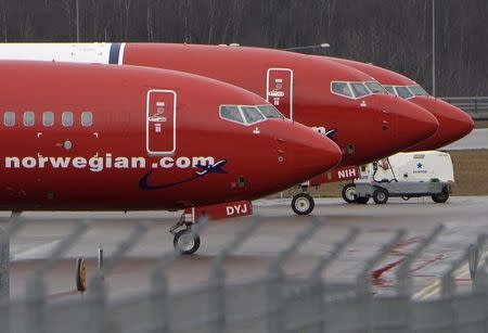 Parked Boeing 737-800 aircrafts belonging to budget carrier Norwegian Air are pictured at Stockholm Arlanda Airport March 6, 2015. REUTERS/Johan Nilsson/TT News Agency