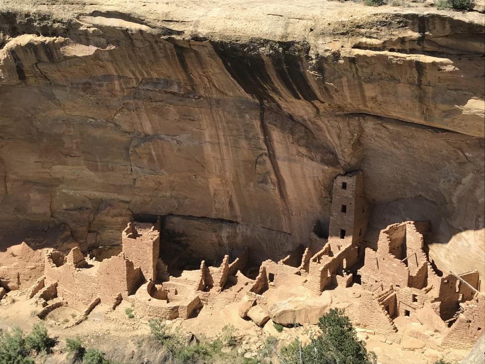 This May 5, 2018 image shows cliff dwellings at Mesa Verde National Park near Cortez, Colorado. The White House announced Wednesday, Oct. 2, 2019, that Finland has agreed to return Native American ancestral remains and funerary objects that where excavated in 1891 from Mesa Verde and ended up in the collection of the National Museum of Finland. (AP Photo/Susan Montoya Bryan)