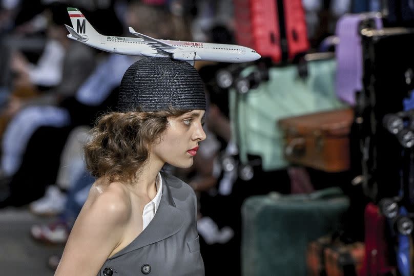 Moschino took runway fashion to new heights with an airplane-topped hat