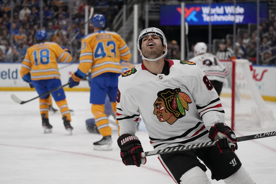 Chicago Blackhawks' Andreas Athanasiou reacts after missing a shot on goal during the third period of an NHL hockey game against the St. Louis Blues Thursday, Dec. 29, 2022, in St. Louis. (AP Photo/Jeff Roberson)