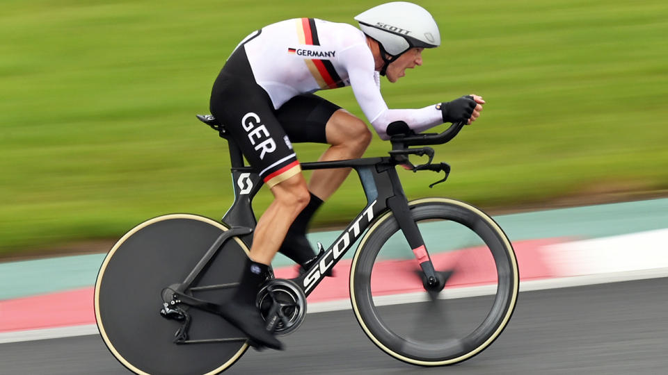 A high-ranking German cycling official was caught on camera making racist comments about competitors during the men's time trial in Tokyo. (Photo by Sebastian Gollnow/picture alliance via Getty Images)