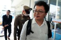 Anon Nampa, a pro-democracy student, one of the leaders of Thailand's recent anti-government protests, is pictured after being arrested, at the police station in Bangkok