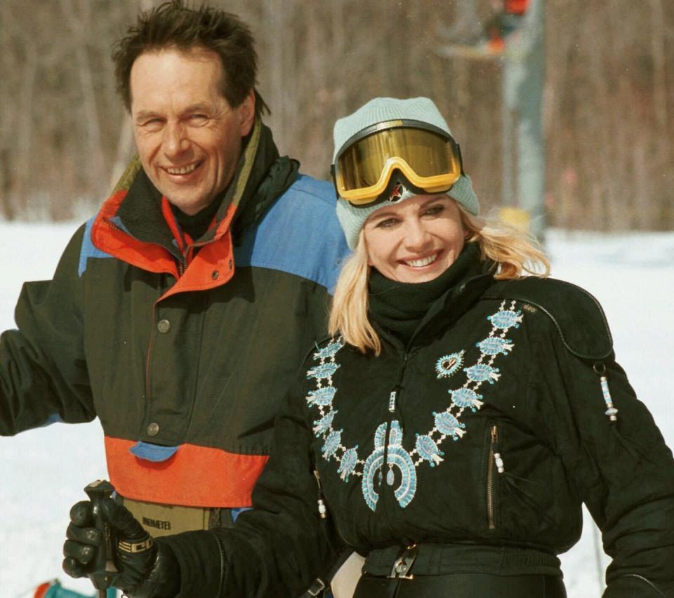 FILE - Ivana Trump stands with friend and former team member of the Czech national ski team, George Syrovatka, during practice runs at the George Syrovatka International Downhill ski race at Jay Peak Ski Area in Jay, Vt., on Saturday, March 4, 2000. Ivana Trump, the first wife of Donald Trump, has died in New York City, the former president announced on social media Thursday, July 14, 2022. (AP Photo/Jon-Pierre Lasseigne, File)