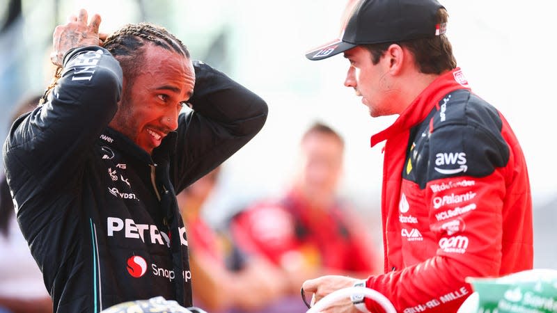Second placed Lewis Hamilton of Great Britain and Mercedes talks with Third placed Charles Leclerc of Monaco and Ferrari in parc ferme after the Sprint ahead of the F1 Grand Prix of United States at Circuit of The Americas on October 21, 2023 in Austin, Texas.