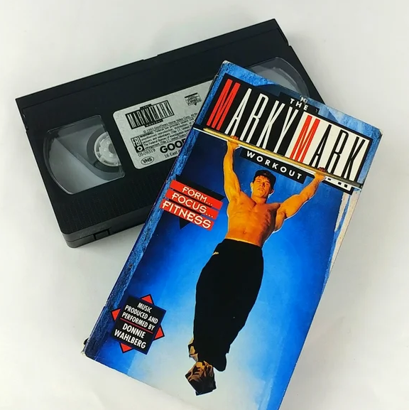 VHS and case of "The Marky Mark Workout" featuring Mark Wahlberg in fitness attire